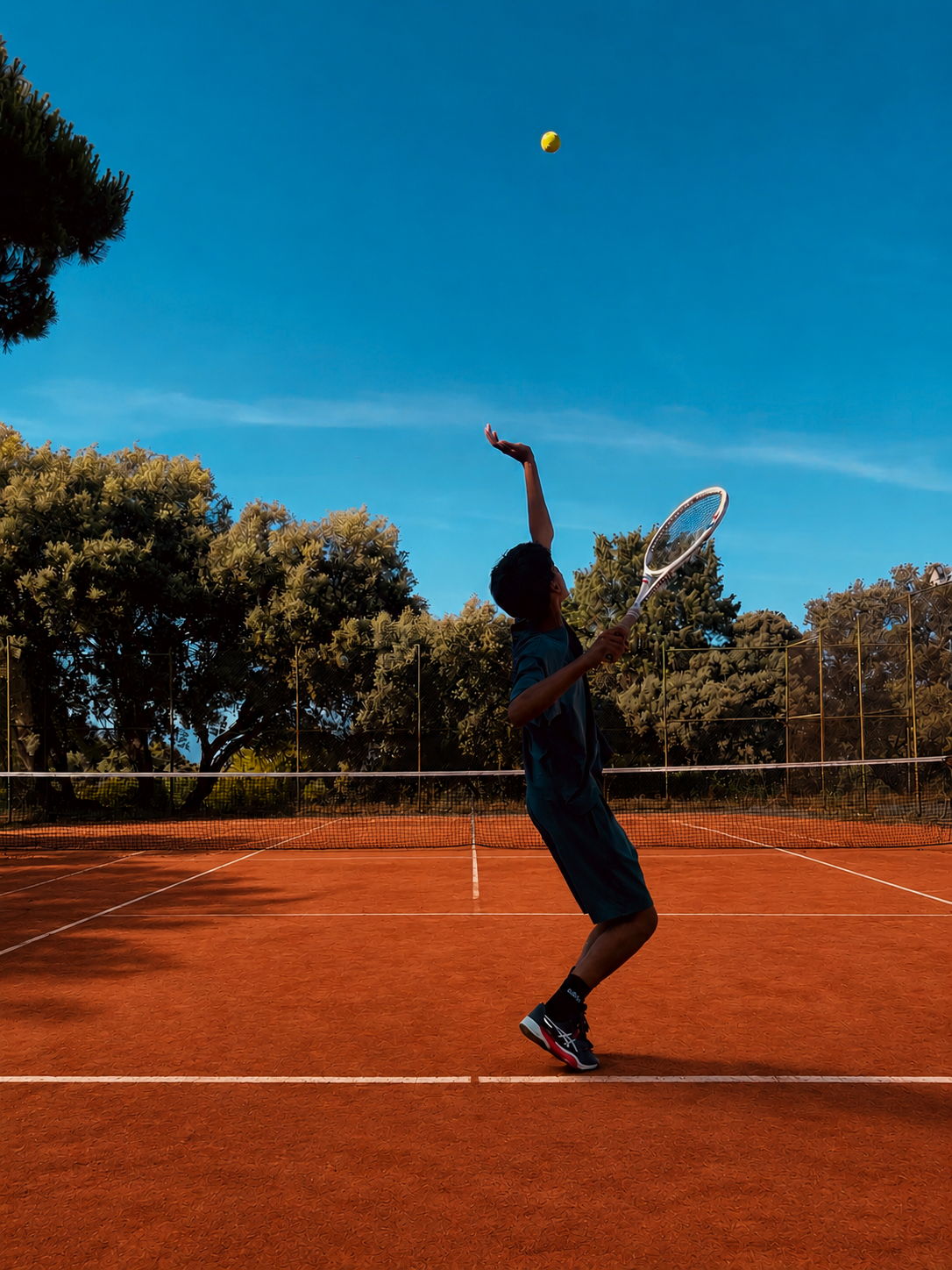 TennisBuddy founder playing tennis